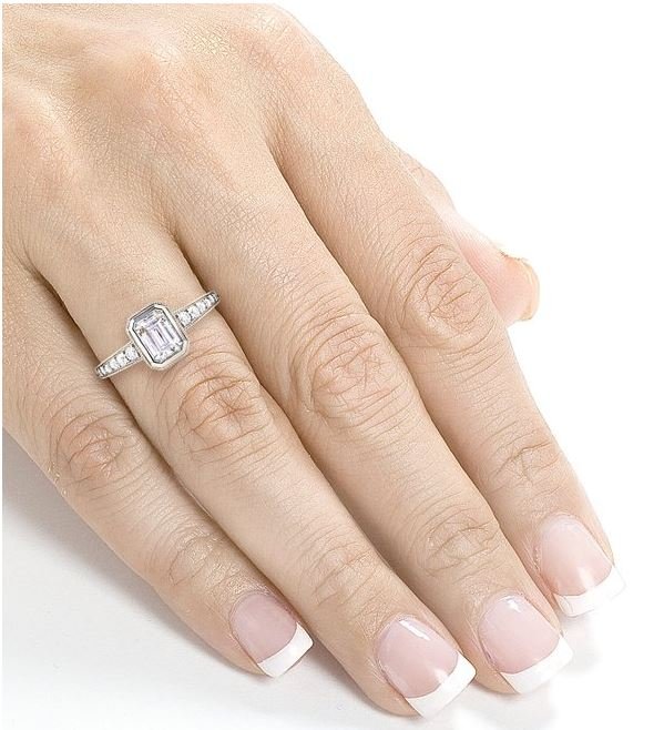 Bezel Moissanite Emerald cut diamond ring in Hand
